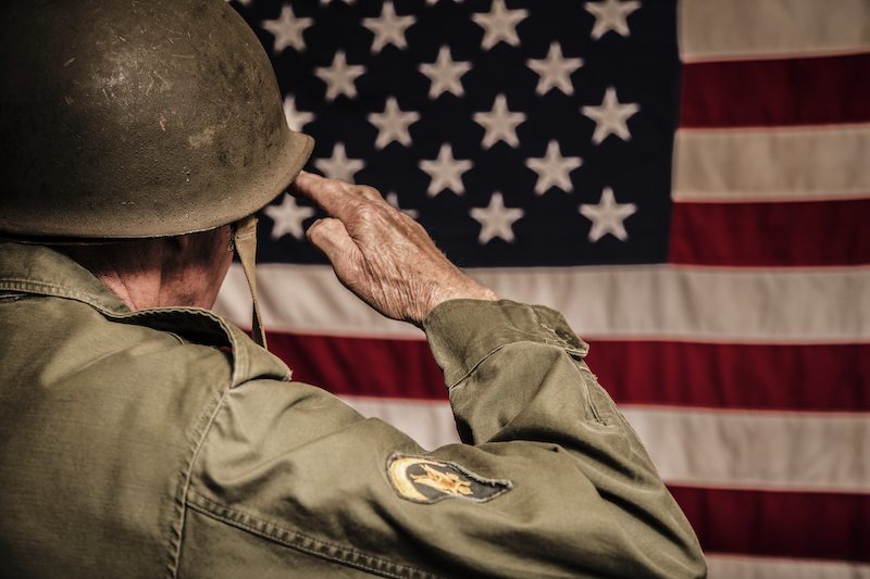 World War II veteran saluting the flag